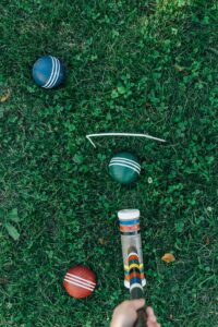 person playing croquet